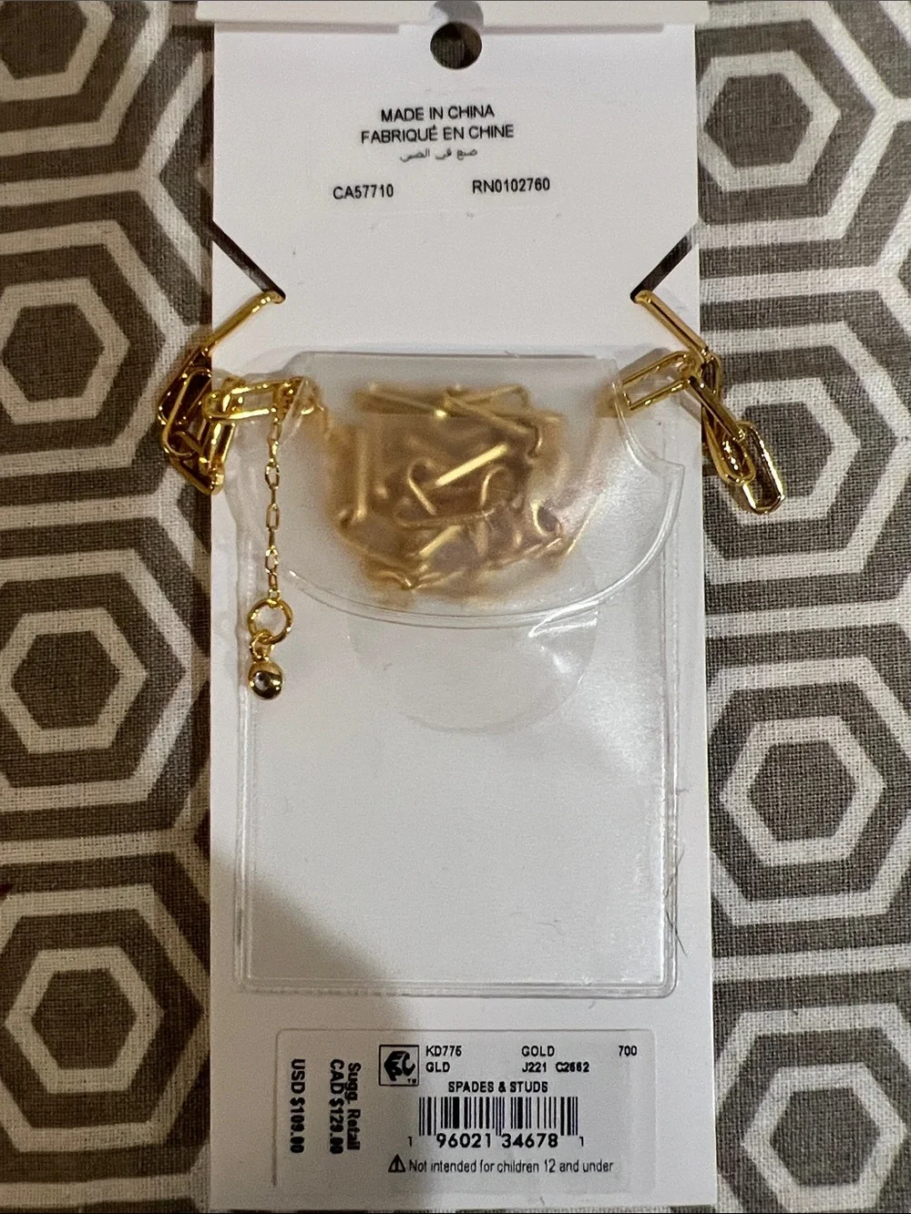 kate spade gold-tone four-leaf clover necklace and stud earring set
